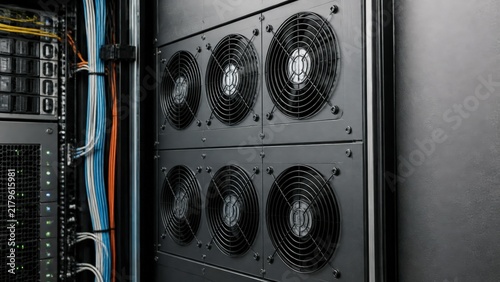 Server rack cooling fans in data center for technology background