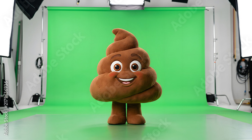 Cute Plush Poop Emoji Character in Front of Green Screen Studio