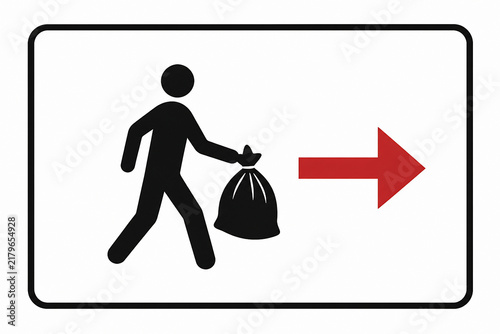 A silhouette of a person carrying a bag is shown on a white sign with an arrow pointing to the right, indicating a trash or recycling area.
