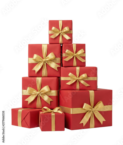 Cuadro en lienzo Stack of red gift boxes with gold ribbon for holiday celebrations