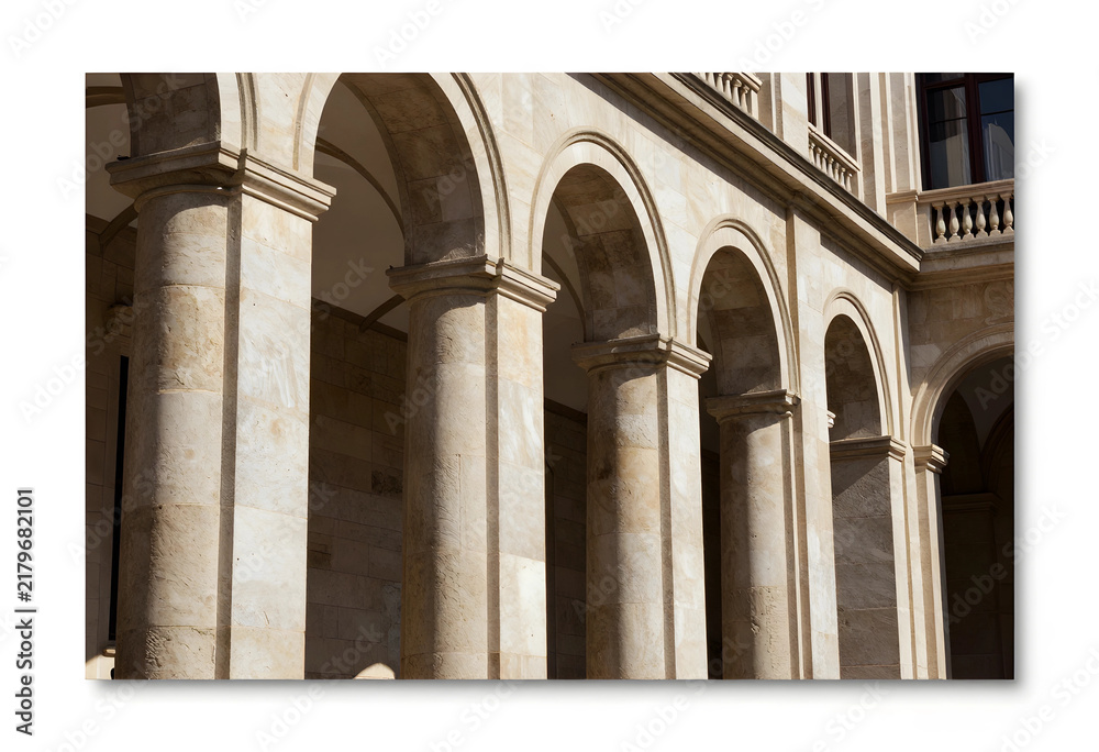 Obraz premium Architecture and heritage preservation, classic stone colonnade with arches in a historic building facade showing structural design and classical style