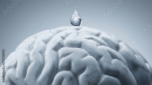 Crystal Water Droplet Falling onto Brain Surface for Mental Clarity Concept