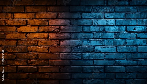 Contrast brick wall background featuring warm orange and cool blue light split ef.