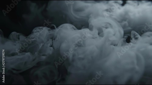 Voluminous Soft Ash Fog Moving Slowly, Unlit Black Environment with Pale Gray Overlay and Harsh Shadows