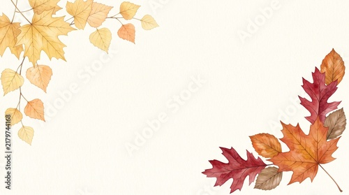 Autumn leaves in shades of red orange and gold on a white background