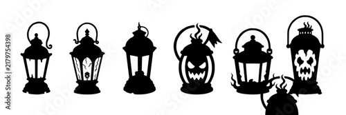 lanterns, one with a bat motif and one with a jack-o’-lantern face, symbolizing Halloween celebration