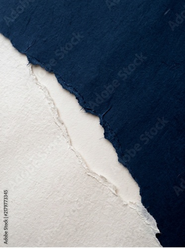 Minimalist Abstract Composition Featuring Torn Edges of Dark Navy Blue and Off White Textured Handmade Paper Sheets for Artistic Backgrounds