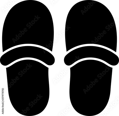 Pair of simple black slippers resting together during a studio shoot isolated on transparent background