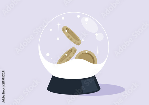 A crystal ball filled with artificial snow, a handful of metal coins inside