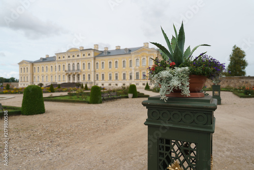 Potted agave plant in the garden with Rundāle Palace blurred in the background