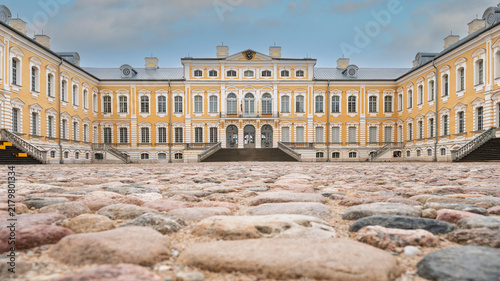 Low angle close-up view of cobblestone ground in front of Rundāle Palace courtyard