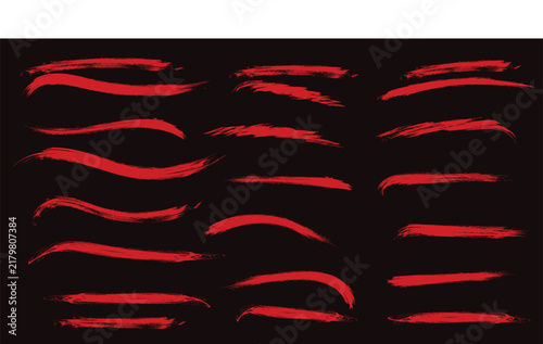 Set of red grungy paint brush strokes isolated on black background for design