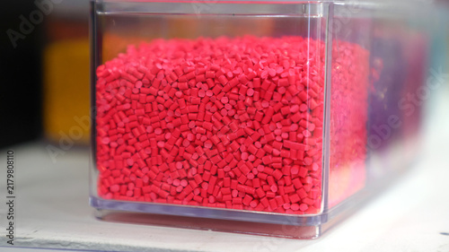 Obraz na płótnie Close up of bright pink plastic masterbatch pellets