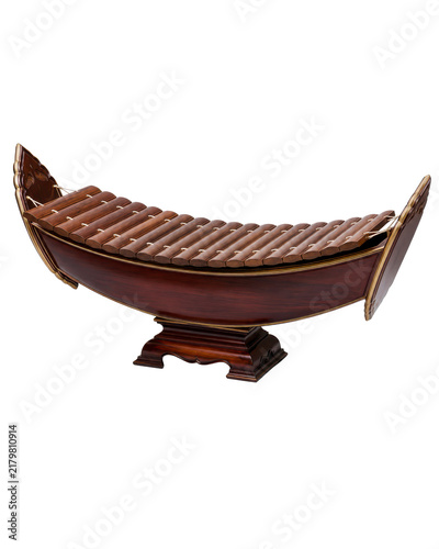 traditional thai ranat ek xylophone with curved wooden resonator on a white studio background