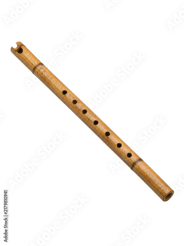 Traditional Thai bamboo flute with fingerholes on white seamless background macro detail