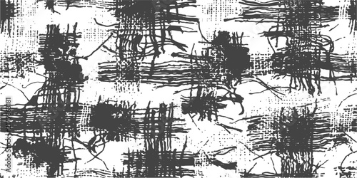 Abstract distressed grunge pattern with dark ink splatters and rough textures on white background