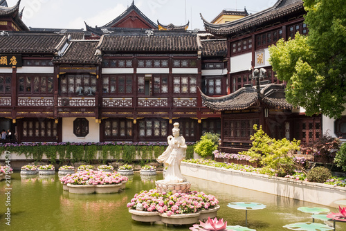 Canvas Print Yu Garden Shanghai features classical Ming style buildings, curved tile roofs, d