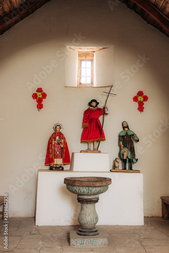 Canvastavla Altar inside iglesia de san pedro de atacama, chile, showing religious statues,