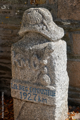 Canvas Print A carved granite milestone shows distance details carved into stone along the Camino