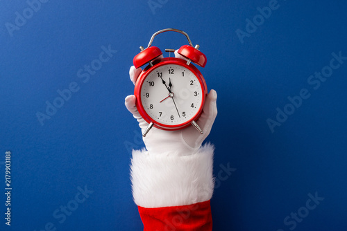 Photography Merry Christmas and happy New Year countdown with Santa Claus holding a red alar