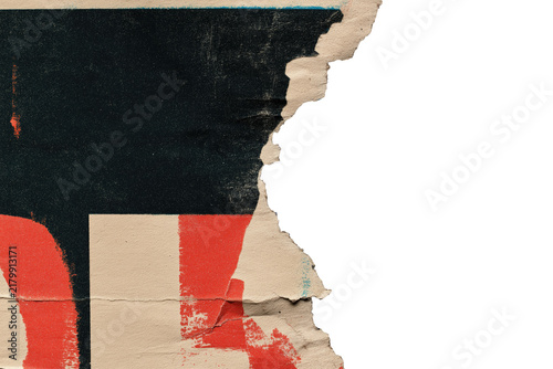 Torn corner fragment of a vintage poster with bold geometric black and red blocks on a transparent background