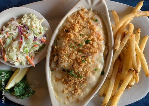 Baked Stuffed Haddock Dinner with French Fries and Coleslaw