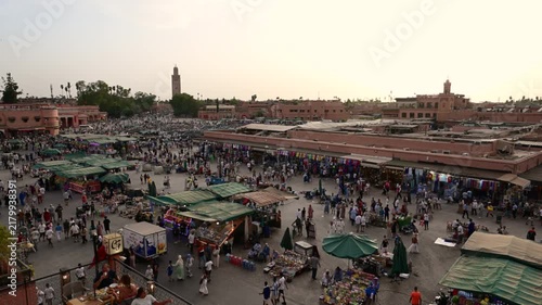 Marrakech, morocco. August 9, 2026. Panoramic elevated view of the bustling jemaa el fnaa square in marrakech, morocco, with crowds of people and market stalls at sunset