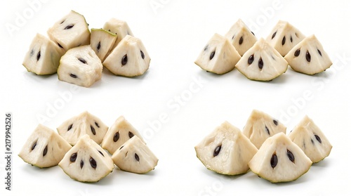 Fresh slices of cherimoya fruit arranged in small groups