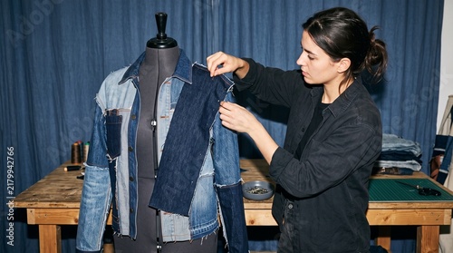 Naklejka Designer reshapes denim into a patchwork overshirt