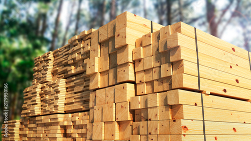 Stacked wooden lumber beams and timber boards arranged in bundles for construction and woodworking. Natural wood texture, cut timber,