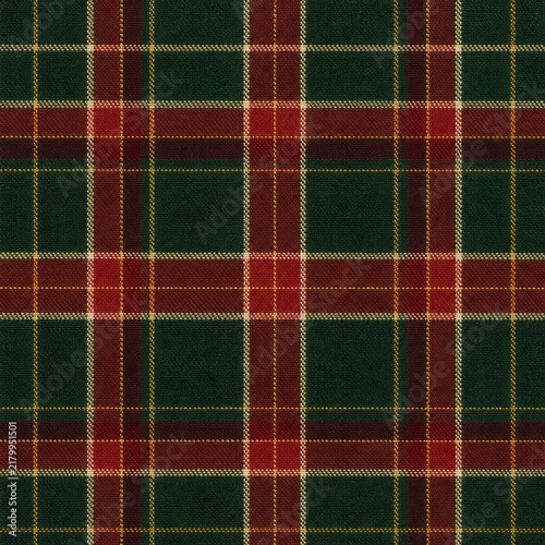 Traditional Christmas tartan seamless pattern with red green and ivory woven wool textile texture
