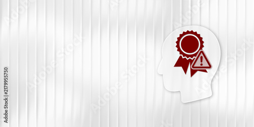 Fotografie A conceptual image showing a human profile silhouette with a red award ribbon and warning symbol, representing false credentials, overconfidence or fake degrees
