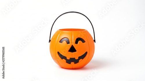 Orange plastic halloween pumpkin trick or treat candy bucket isolated on white background