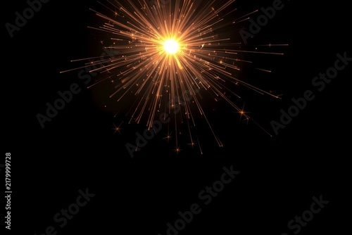 Golden fireworks starburst light effect on black background