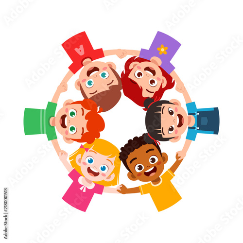 Diverse happy children boys and girls holding hands in a circle showing unity and friendship with big smiles