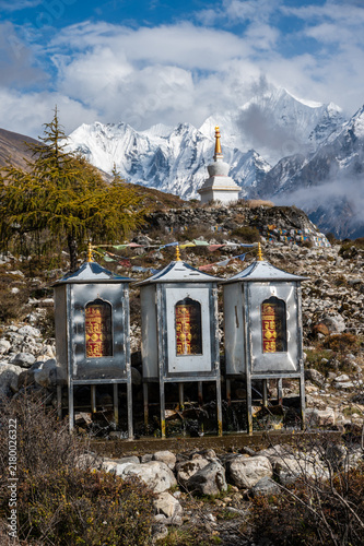 Принти на полотні Water powered prayer wheel on the way to Kyangjin Kharka village in Langtang National park in Nepal