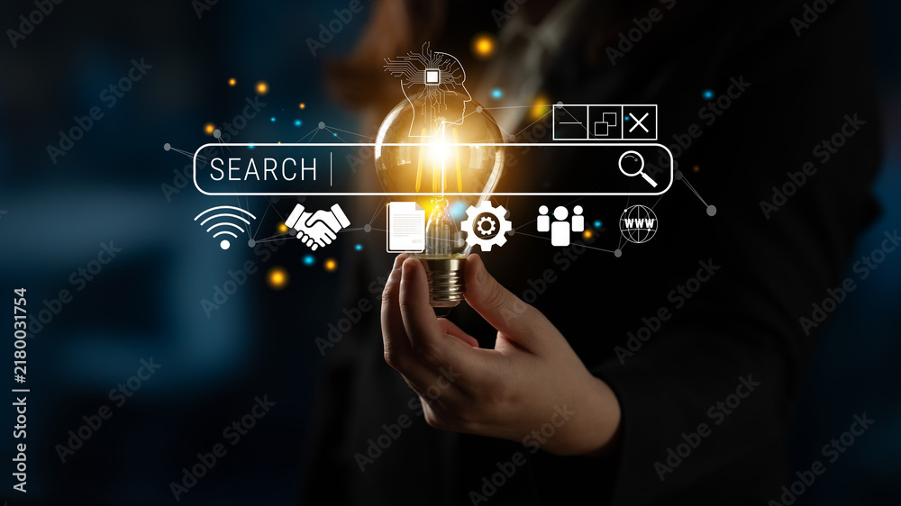 Obraz premium Innovative Concept of Light Bulb with Search Bar and Digital Icons Representing Creativity, Ideas, and Modern Technology Fusion in a Business Environment Quark.