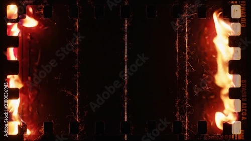 Flickering flames burning through perforated film strip edges on transparent background