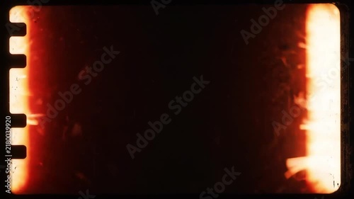 Film strip showing burning fire effects with light leaks with effect on transparent background