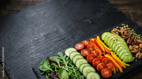 Various healthy vegetables for salad in grey background copy space healthy lifestyle campaign 