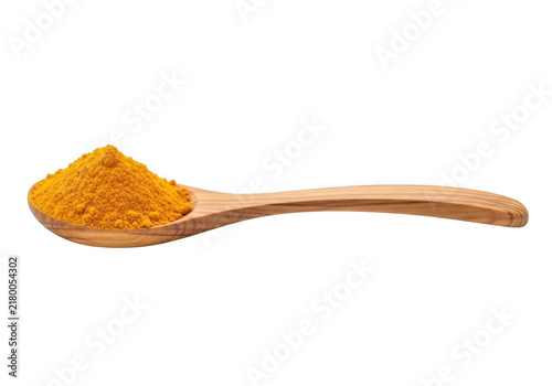 Wooden spoon with turmeric powder