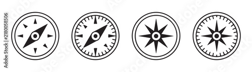 Navigational compass icon set with black geometric direction markers for travel adventure and maps.