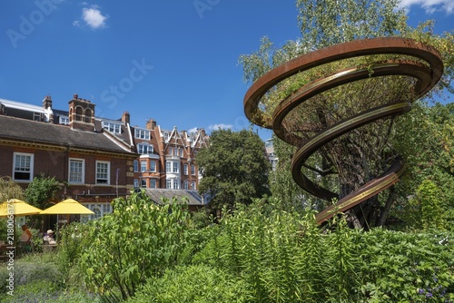 Spiral shaped monument, at the same time modern corten steel trellis, lists the names of all curators and gardeners of the Chelsea Physic Garden, historic botanical garden, oldest botanical garden in London, founded in 1673 by the Worshipful Society of Apothecaries, Chelsea, England, Great Britain