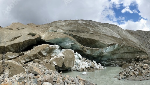 Canvas Print Exposed glacier ice and debris along the Shkhara Glacier trekking route near Mes