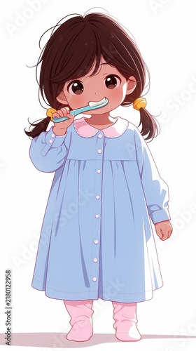 A young girl in a blue nightgown brushing her teeth with a cheerful expression.
