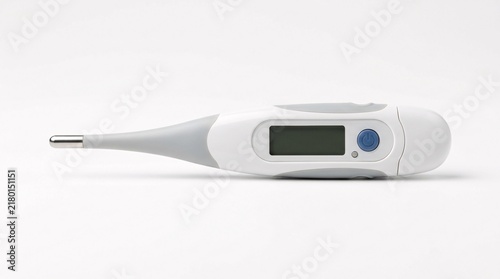 Modern digital medical thermometer with blue button for measuring body fever isolated