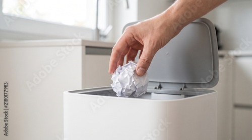 Discarding Crumpled Paper into Modern Waste Bin: Waste Management & Clean Living Concept