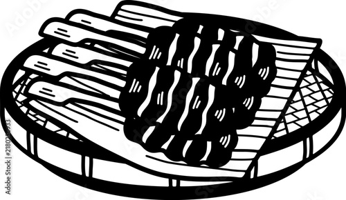 Фотография black and white of Thai Grilled Pork Skewers on a Banana Leaf moo ping