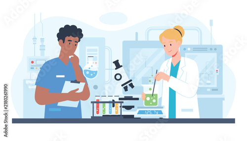 Professional multiethnic scientists conducting chemical experiments in a modern laboratory research facility.