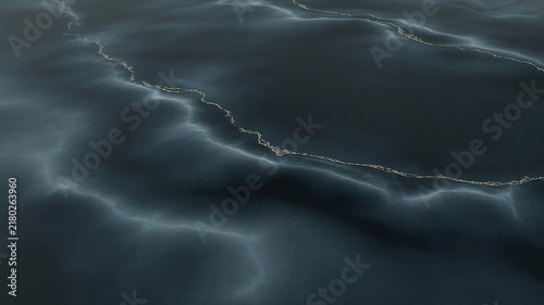 Dark textured surface resembles a cracked earth or deep ocean floor